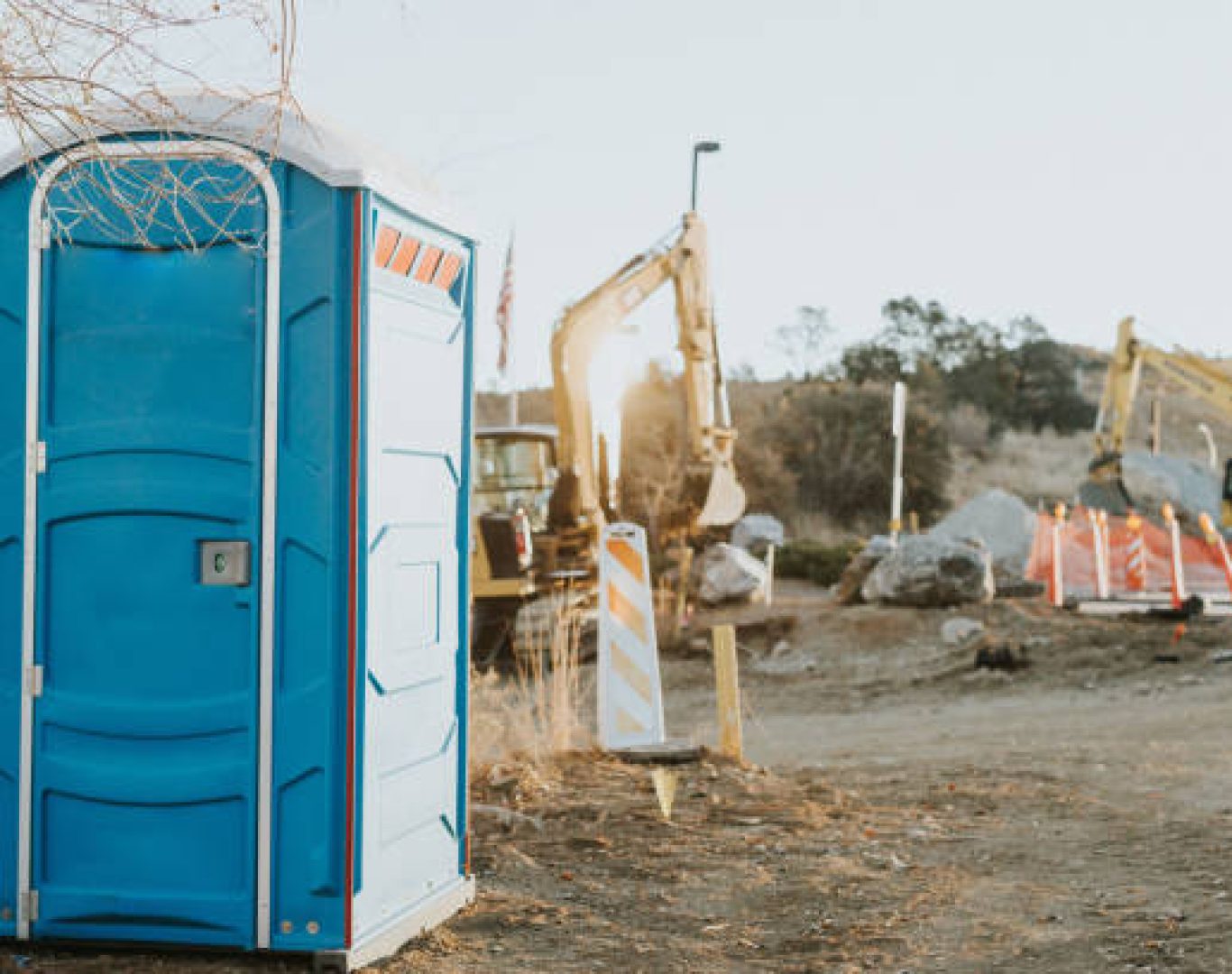 Nomad Rentals delivering reliable construction toilet units for active job sites.